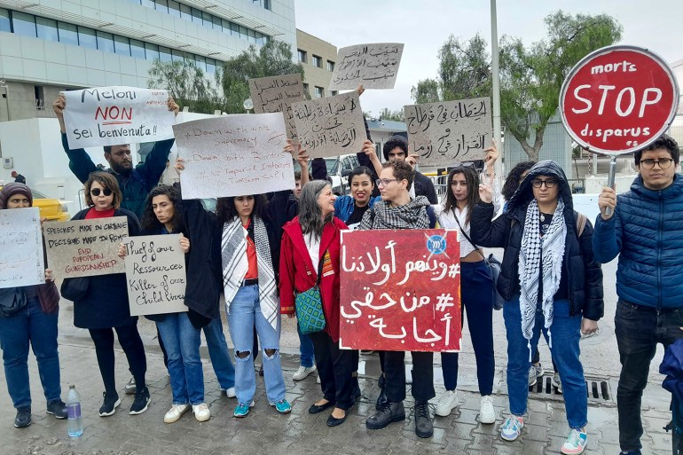 Protesters outside the EU Delegation in Tunis demonstrate against the bloc's externalisation policies 